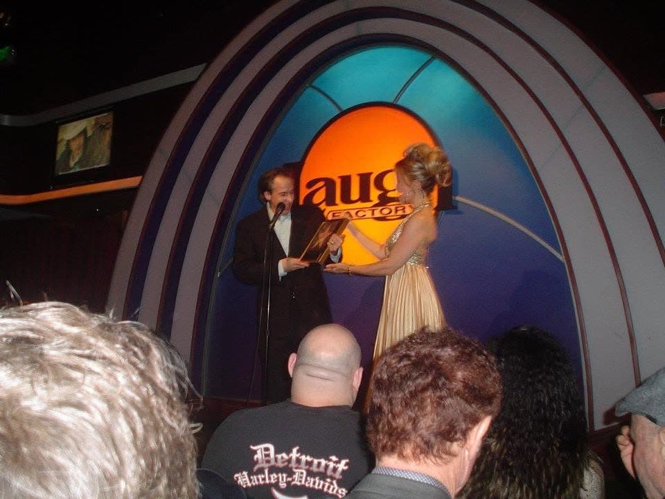Elvis Winterbottom accepting the L.A. Comedy Awards trophy